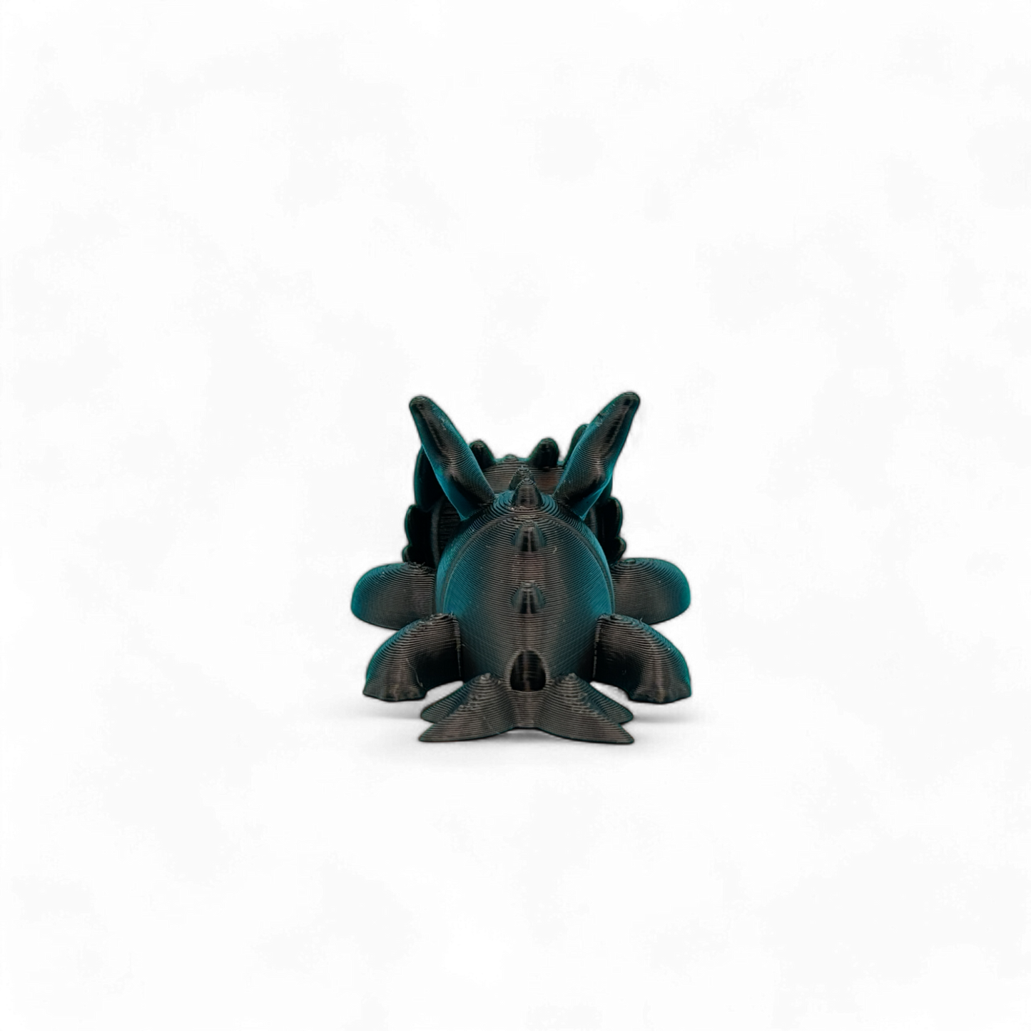 3D-Geprinte toothless flexi sleutelhanger, zwart lichaam met gif groene ogen, achterkant